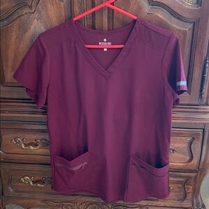 2 pieces scrubs. Med Couture. pants and top. Perfect 
coedition. size medium.